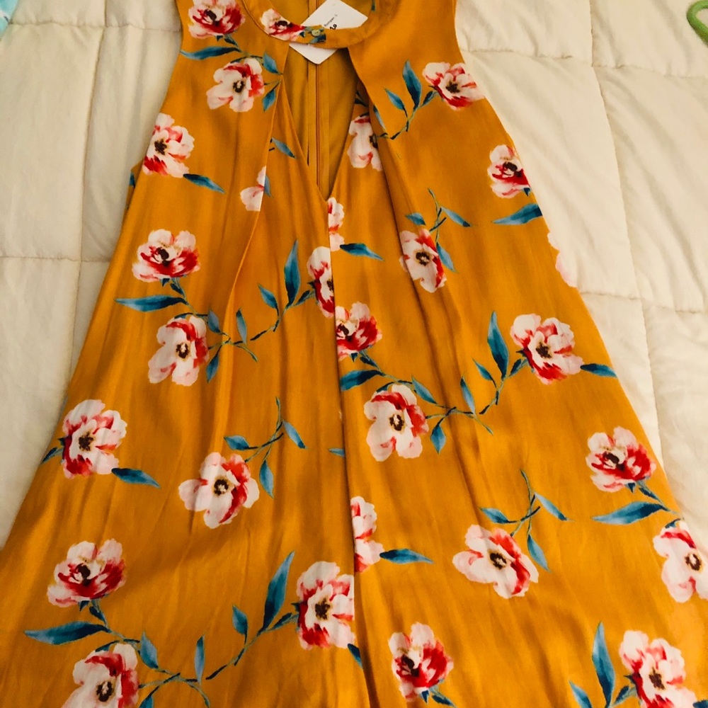 Cheerful floral yellow romper